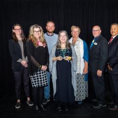 The Friends of the Verde River stand with their award at the ceremony.