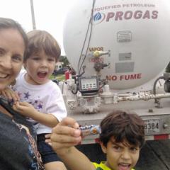 After two days on rotation with their neighbors sitting on the main street watching for the gas delivery truck, this was the family's look of joy when it arrived for the first time since the hurricane. They were down to 3%.