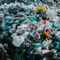 mountains of plastic waste sit in piles