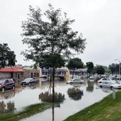 Perrault writes op-ed on the mounting costs of climate risk for imperiled cities