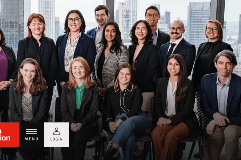 A group photo of the 2023 Skadden Fellows, with logo and learn more links superimposed