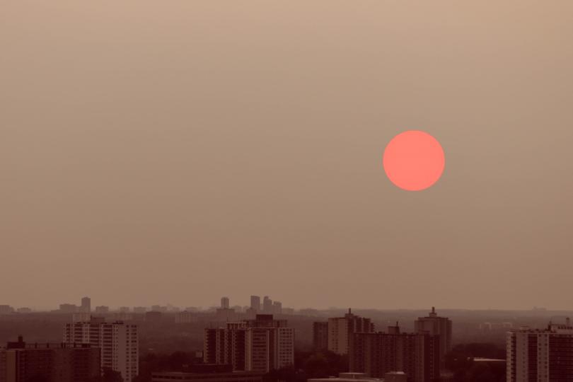 Smoky haze and a red sun over Toronto