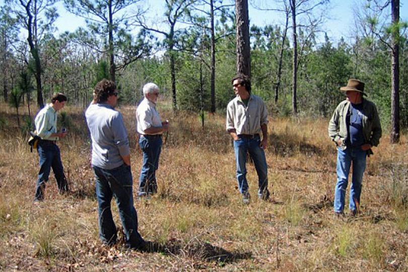 C. Josh Donlan and Todd Garter in the field