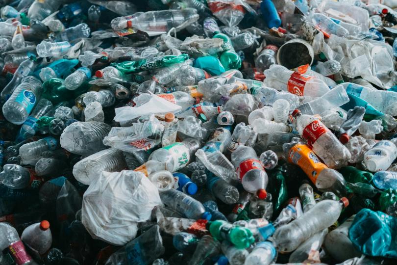 mountains of plastic waste sit in piles