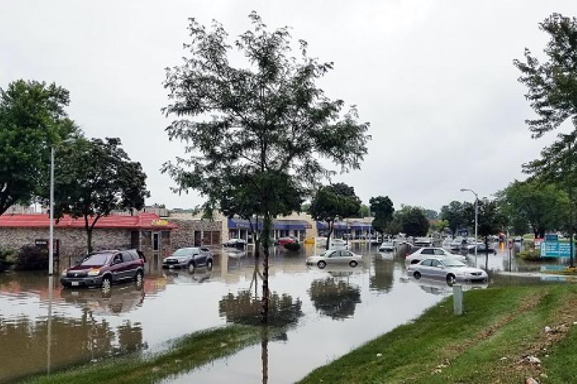 Perrault writes op-ed on the mounting costs of climate risk for imperiled cities