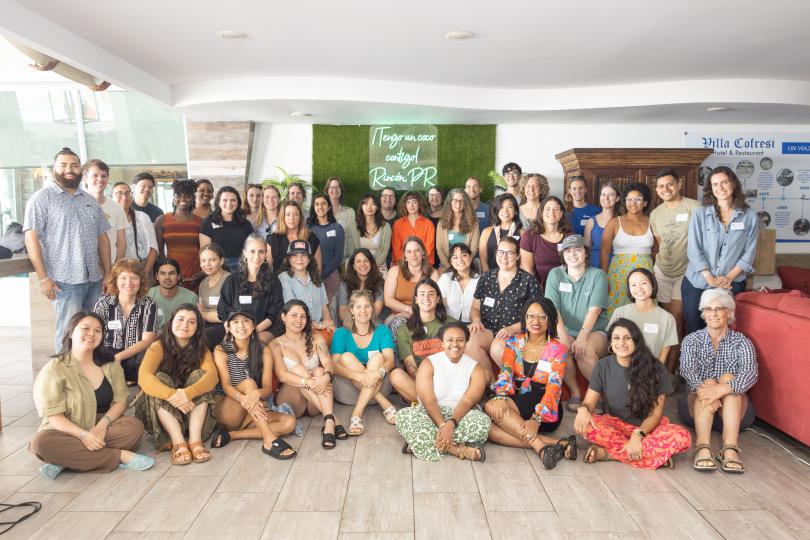 A group photo of Fellowship to Friendship participants in the lobby of Villa Cofresí.