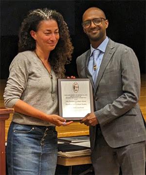 Asta receives the Donald Cunnigen Award for Excellence in Graduate Studies at URI.jpg